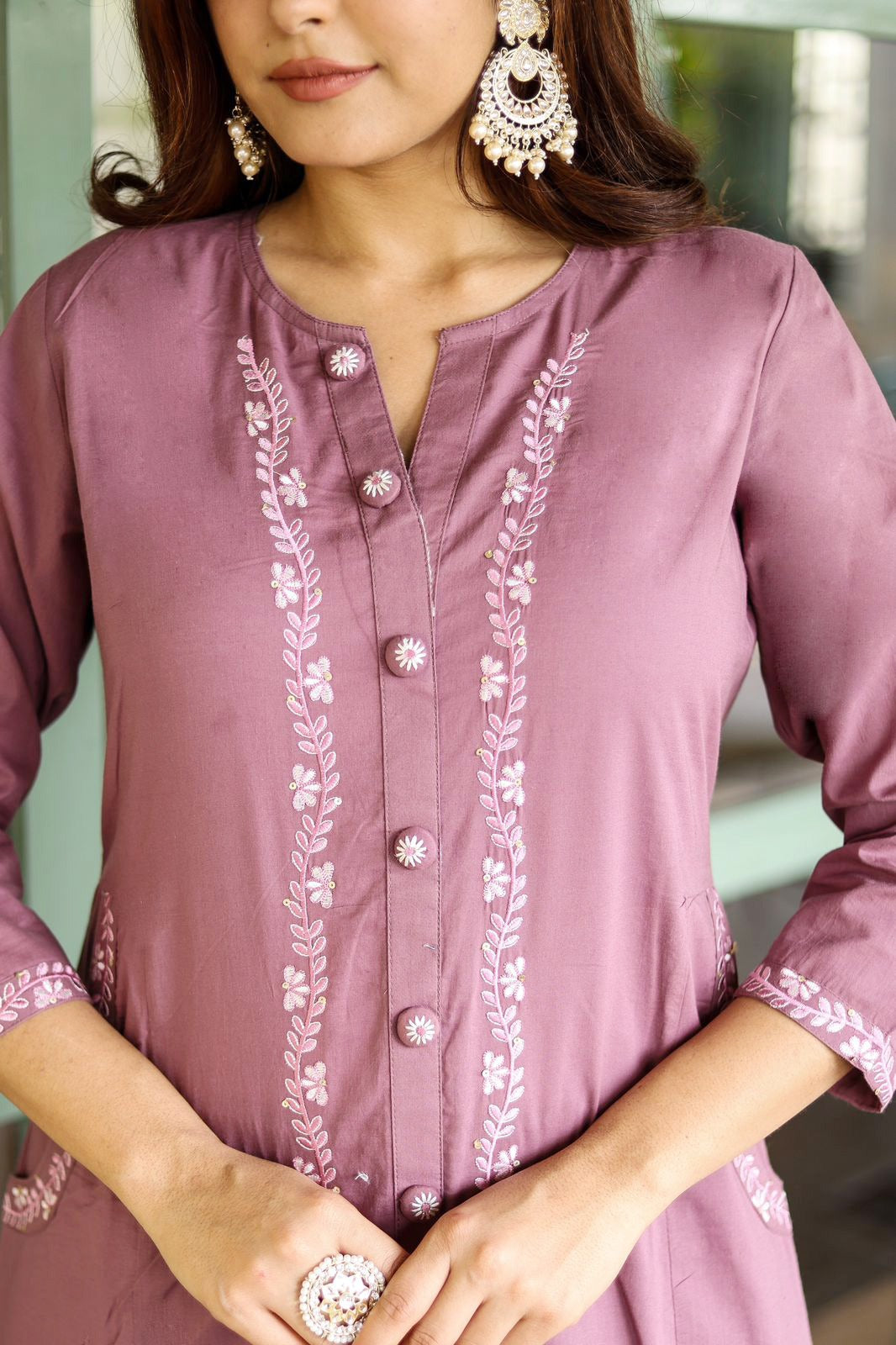 Opulent Aura: Embroidered Cotton Kurti with Both Side Pocket Button Accents and Stylish Pants