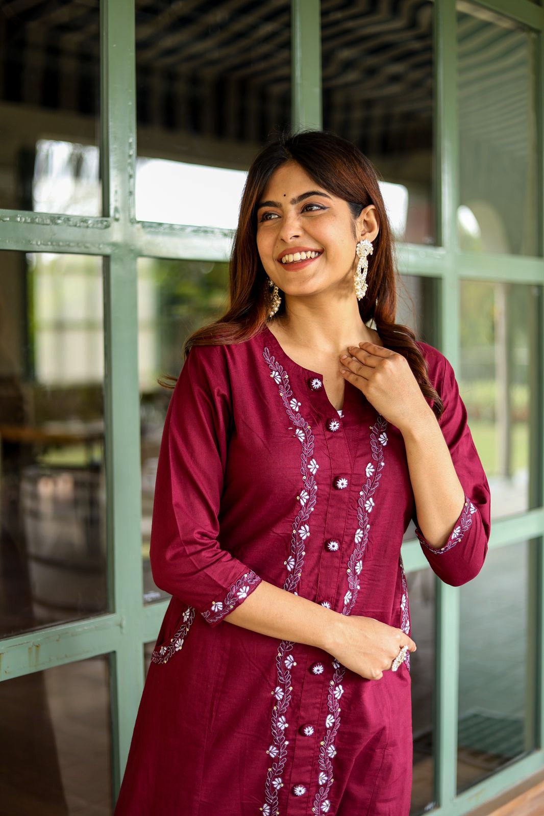 Opulent Aura: Embroidered Cotton Kurti with Both Side Pocket Button Accents and Stylish Pants
