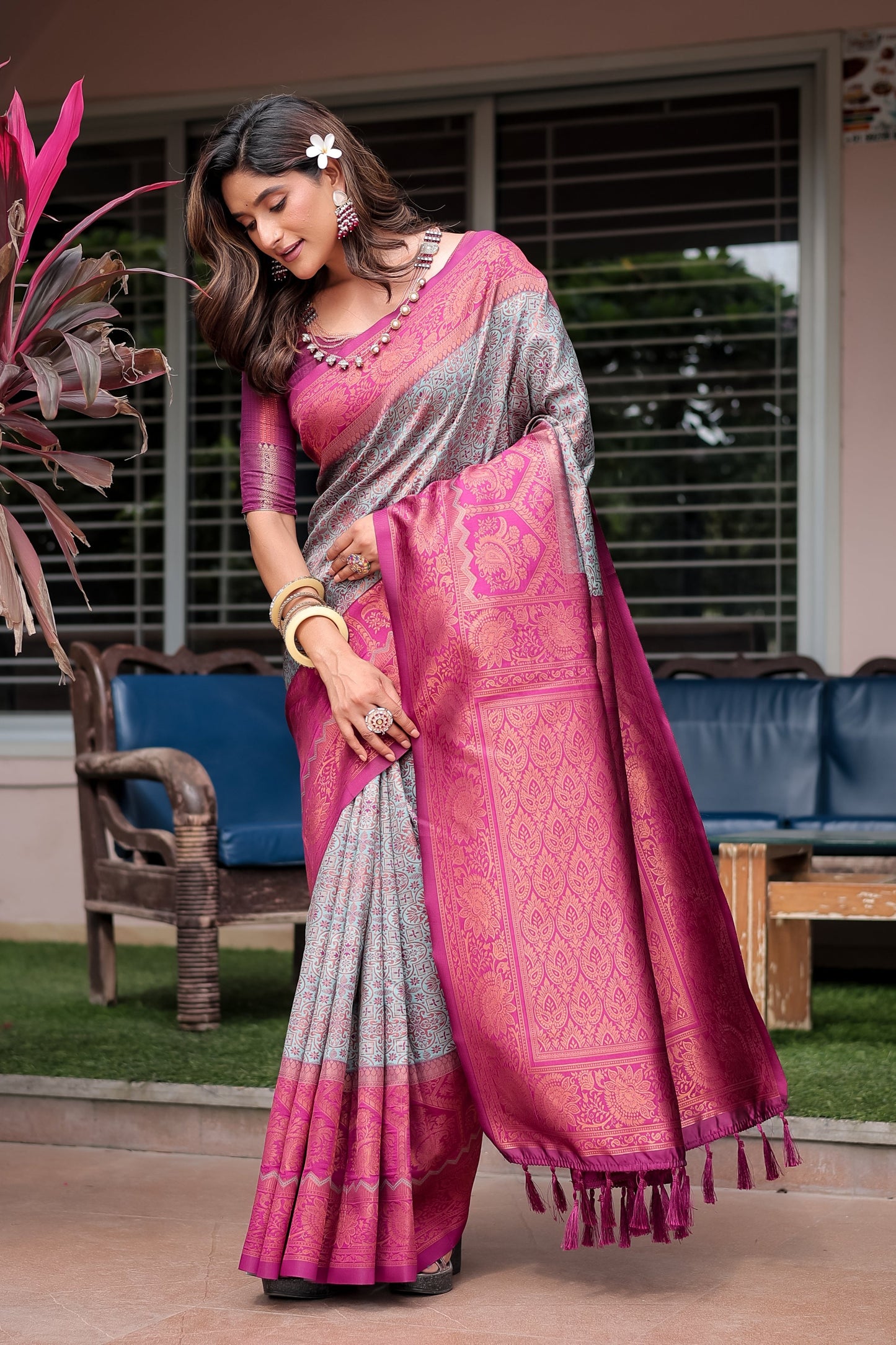 Luxe Banarsi Silk Saree with Designer Tassels and Dual Satin Effect