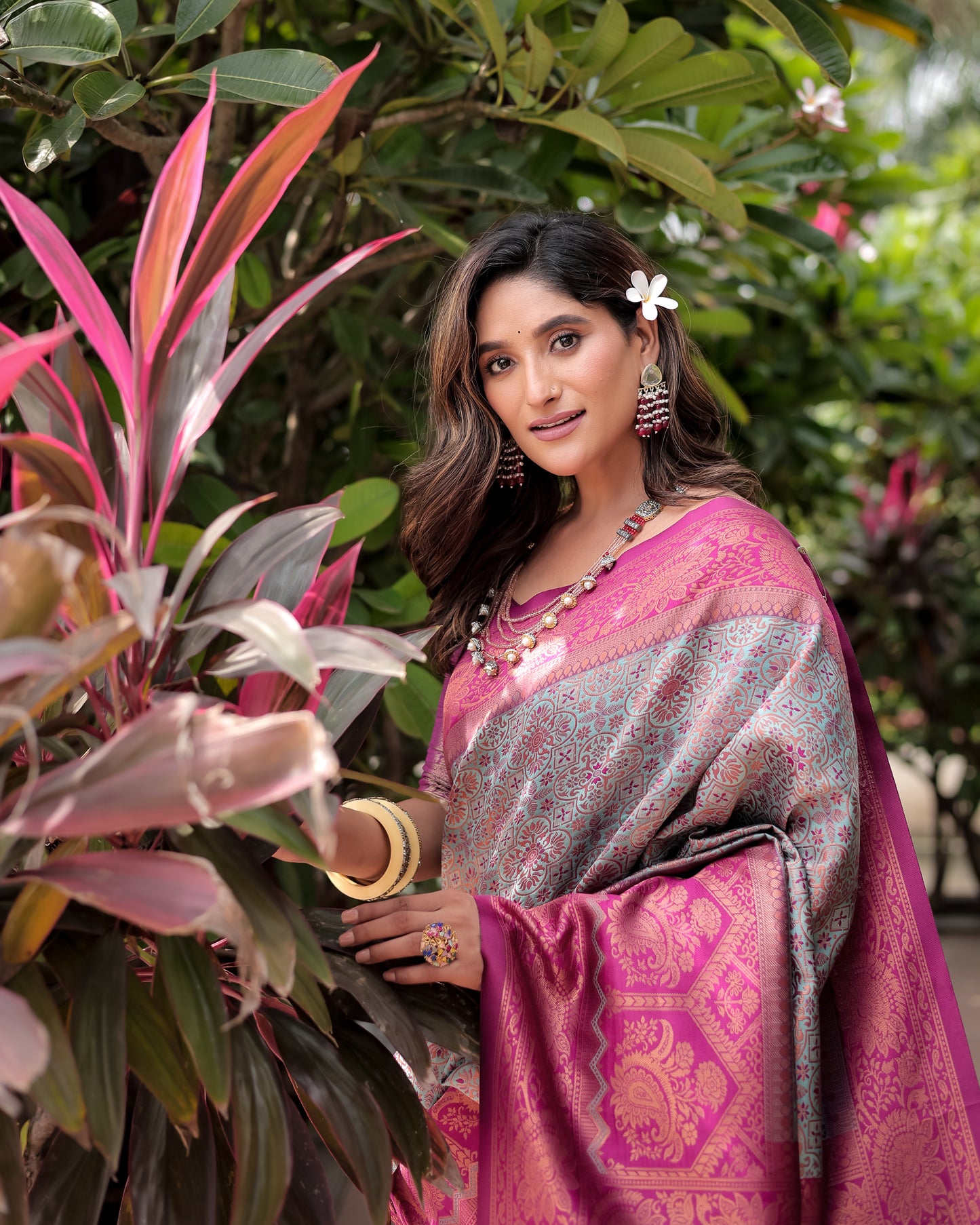 Luxe Banarsi Silk Saree with Designer Tassels and Dual Satin Effect