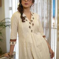 Graceful Off-White Kurta with Embroidered Yoke and Printed Pants