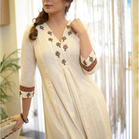 Graceful Off-White Kurta with Embroidered Yoke and Printed Pants