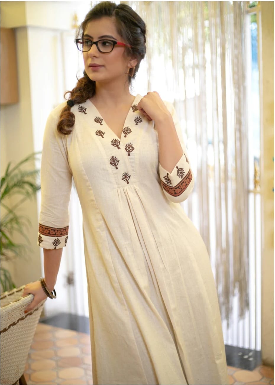 Graceful Off-White Kurta with Embroidered Yoke and Printed Pants