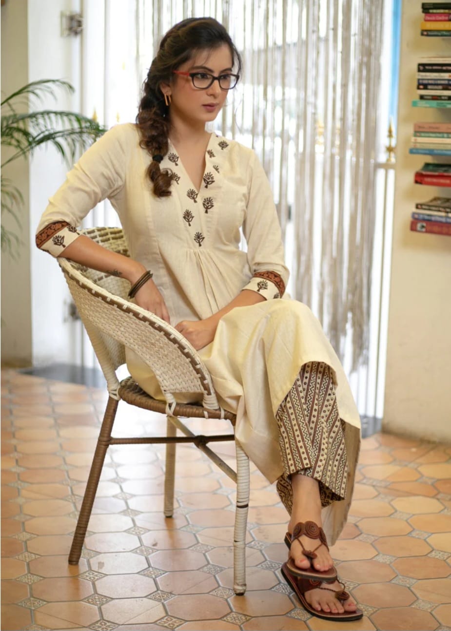 Graceful Off-White Kurta with Embroidered Yoke and Printed Pants