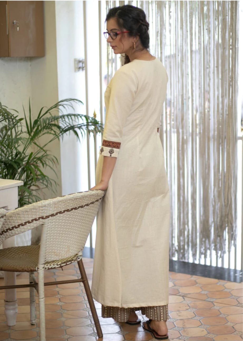 Graceful Off-White Kurta with Embroidered Yoke and Printed Pants