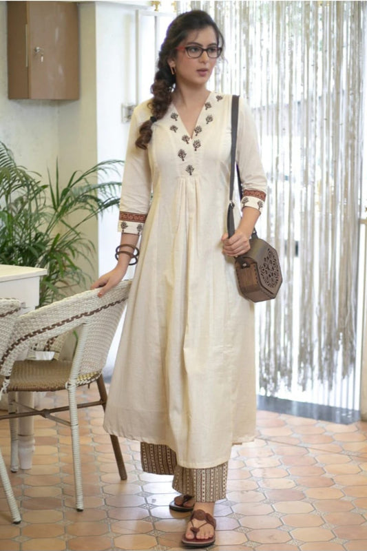 Graceful Off-White Kurta with Embroidered Yoke and Printed Pants